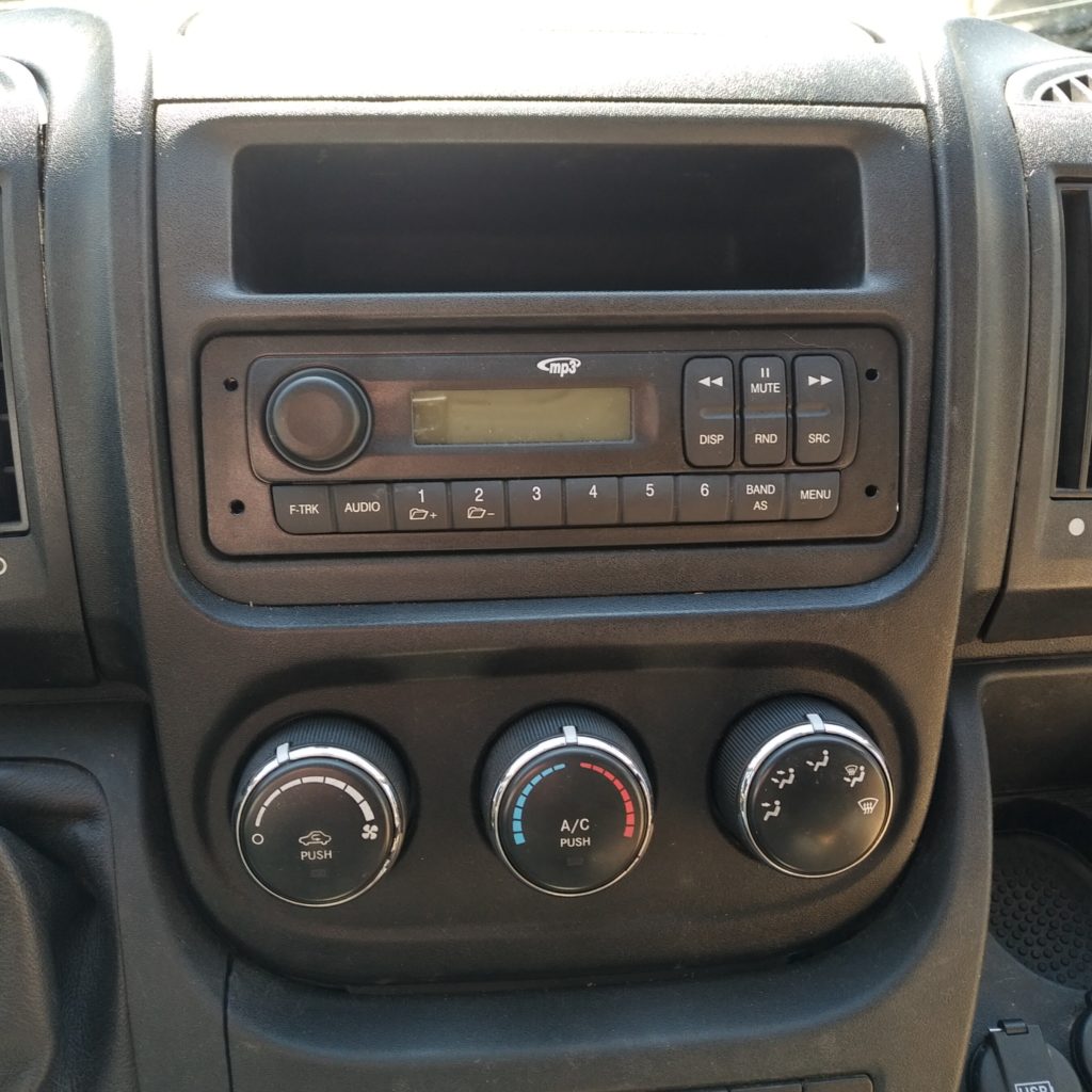 This bare-bones Ram truck OEM stereo just had to go
